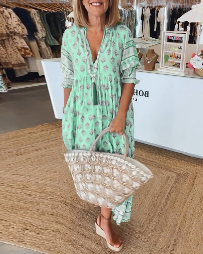 MANA | Chic floral midi dress with V-neck
